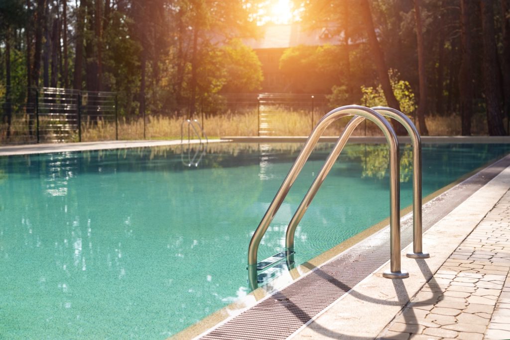 luxury rectangle pool at sunset